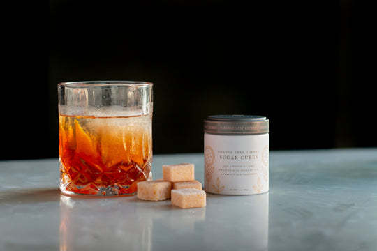 Orange-Cherry flavour-infused sugar cubes from Storied Goods. Handmade with high-quality ingredients.